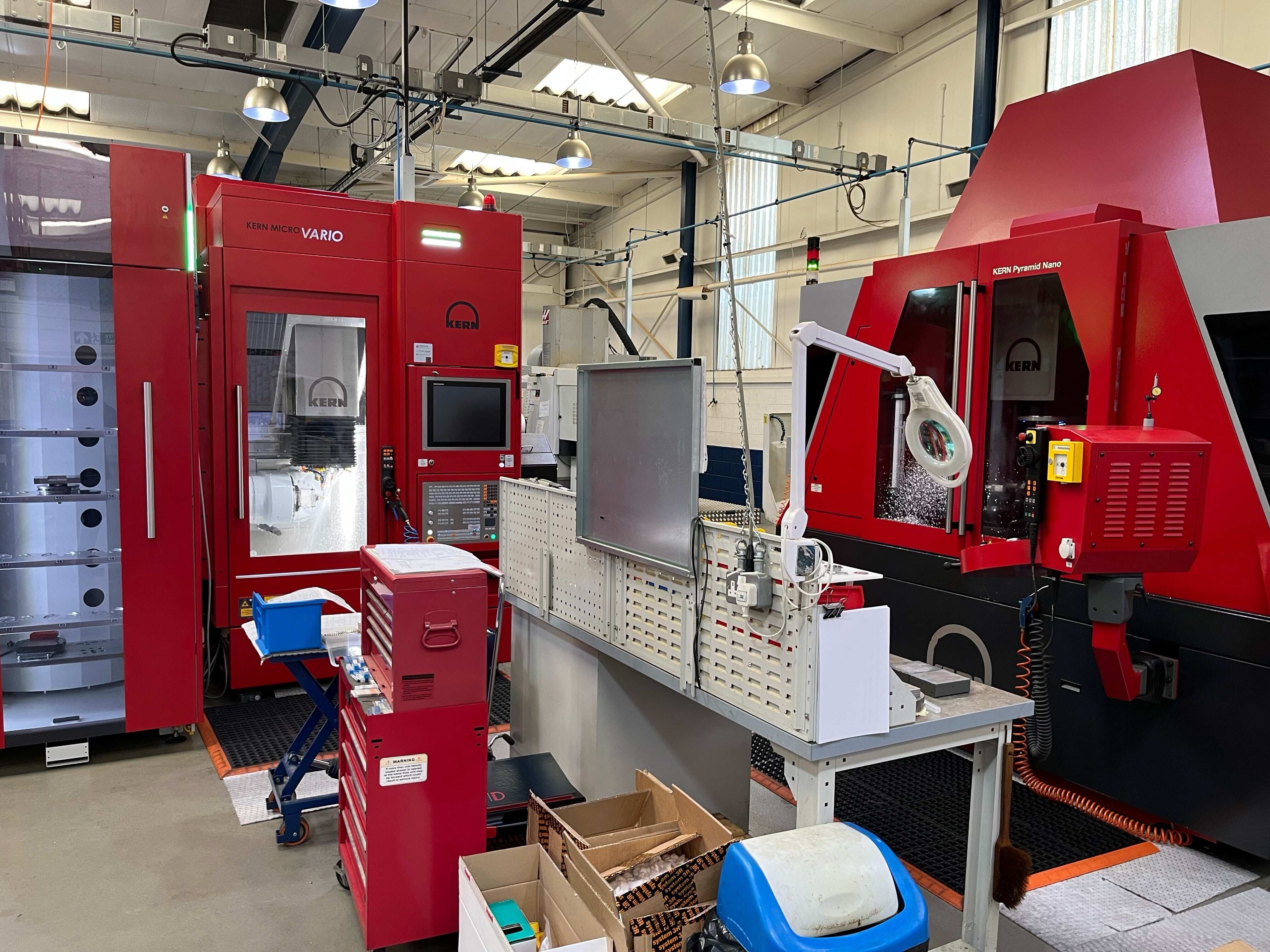 Interior of WLR Precision Engineering Limited featuring Kern automated production machines, including the Kern Micro Vario and Kern Pyramid Nano, showcasing advanced precision engineering technology in a clean and organised workspace.